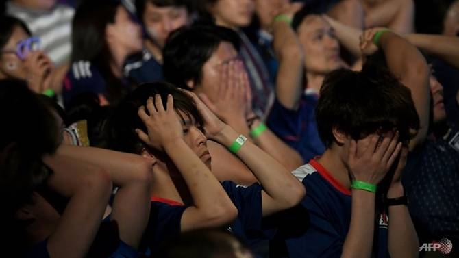 stunned silence in tokyo as japan dream ends