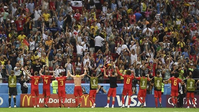 world cup belgium hold off brazil fightback to reach semi finals