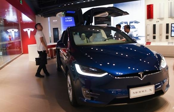 Tesla unveils Shanghai factory plans amid US-China trade row