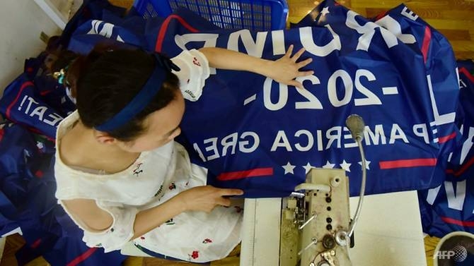 as trade war rages trump flags fly out of china factory