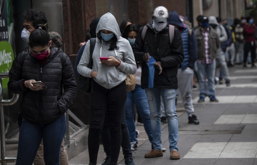 Chile crosses 10,000 virus deaths as president announces aid package