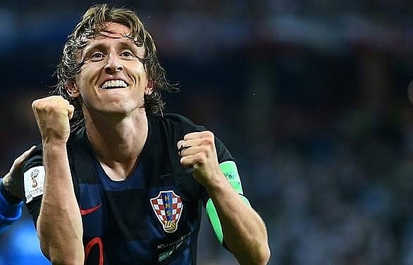 Modric returns to Real Madrid training amid doubts over future