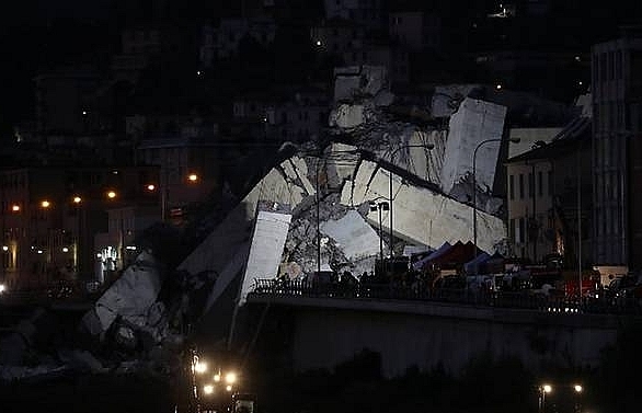 Floodlight search for survivors after deadly Italy bridge collapse
