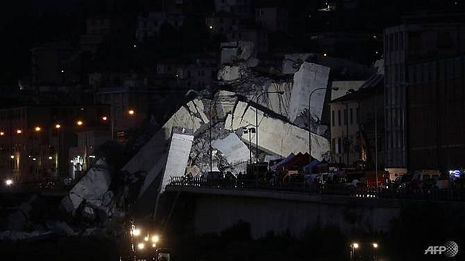 floodlight search for survivors after deadly italy bridge collapse