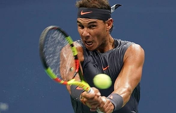 Nadal sends injured Ferrer into Grand Slam retirement