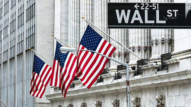 Wall Street gains on reduced rate hike fears, Nasdaq breaks record