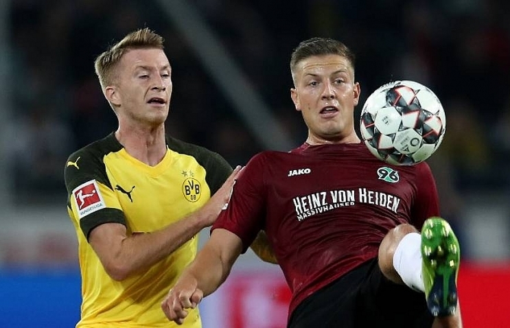 Dortmund held on way to first scoreless draw of Bundesliga season