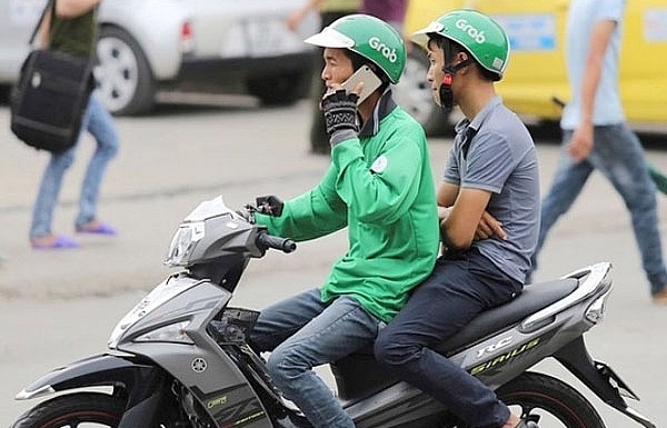 Grab riders to get penalised for using phones while riding