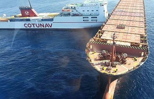 Race to clean up oil spill after cargo ships collide off Corsica