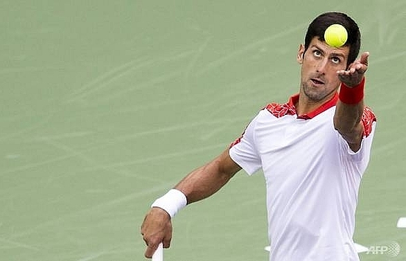 Federer fires to join Djokovic in Shanghai semis
