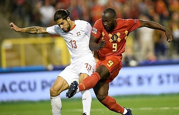 Lukaku strikes twice as Belgium battle past Switzerland