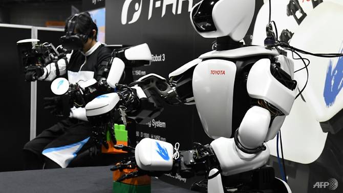 Toyota showcases humanoid robot that mirrors user