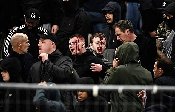 Ajax fans injured in violence-hit Athens Champions League match
