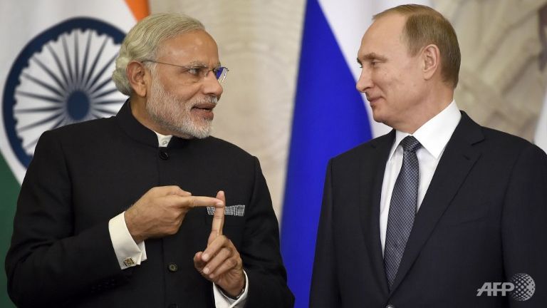 putin modi hail partnership as india eyes defence deals