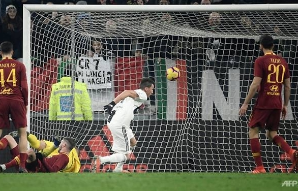 Mandzukic on target as Juventus pile misery on Roma