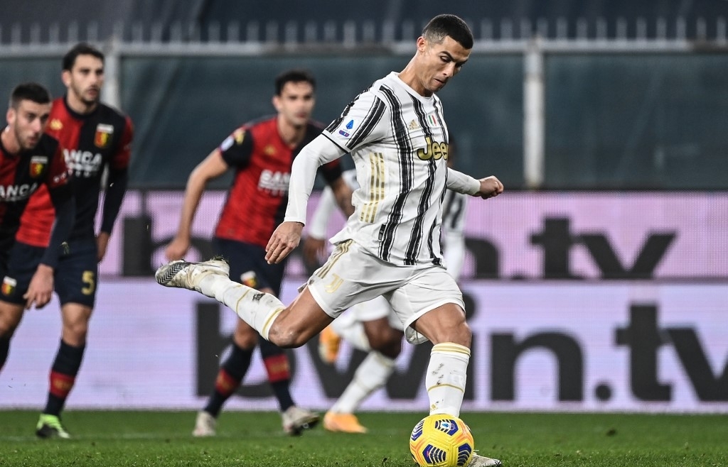 Ronaldo marks Juve century as late Hernandez brace rescues AC Milan