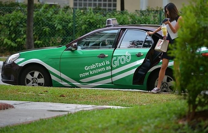 Grab and Uber to extend ride-hailing pilot programme