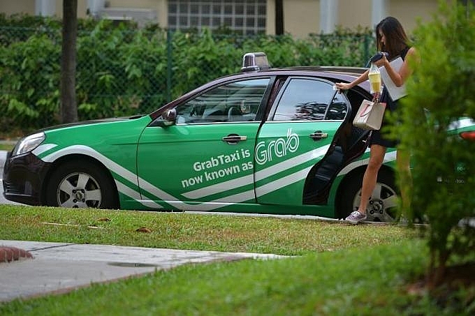 grab and uber to extend ride hailing pilot programme