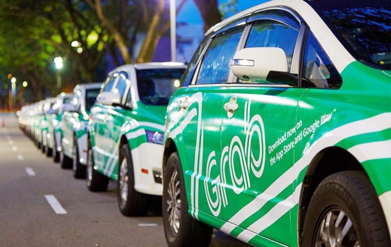 Grab and Uber as taxi firms: a step back in the Industry 4.0 era?