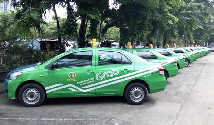 traditional taxi firms urged to apply technology and adapt to ride hailing trend