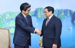 Prime Minister Pham Minh Chinh receives JBIC Governor