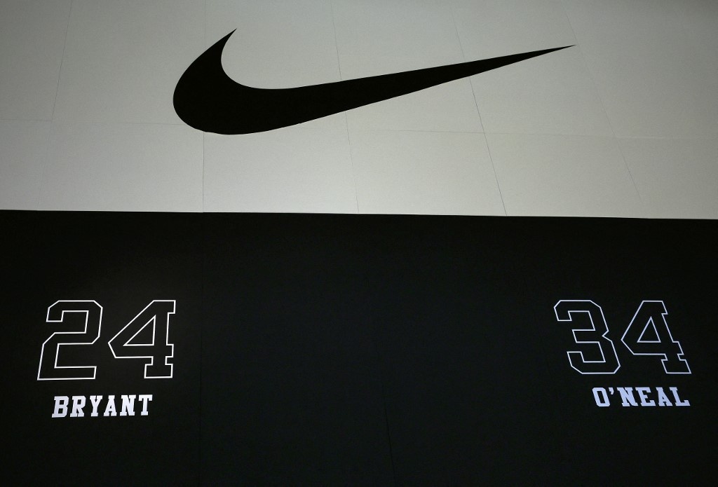 Nike shares tumble as it reports lower profits