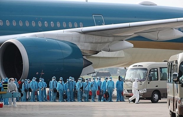 Up to 54 defendants prosecuted in repatriation flight bribery scandal | Society | Vietnam+ (VietnamPlus)