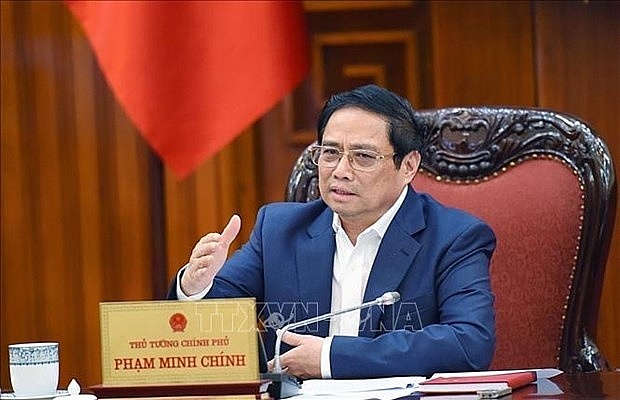 PM works with ministries, agencies on finance-banking activities | Business | Vietnam+ (VietnamPlus)