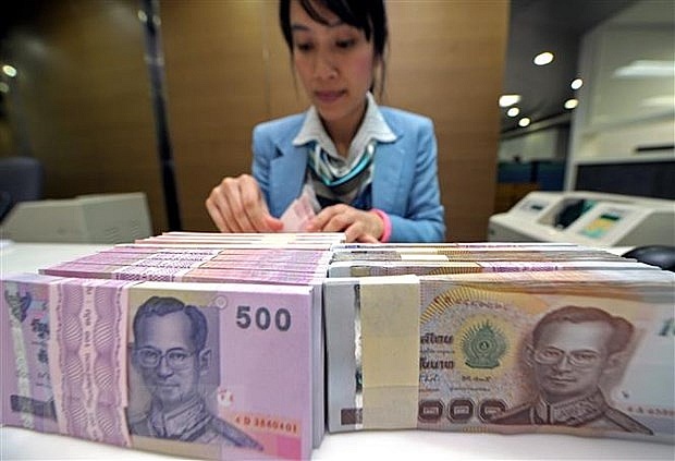 Malaysian, Thai economies suffer as currencies slide | World | Vietnam+ (VietnamPlus)