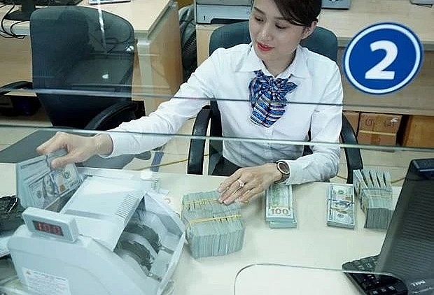 Reference exchange rate down 3 VND on August 2