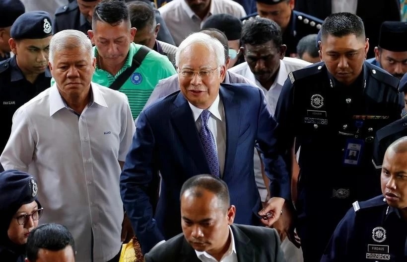 Former Malaysian PM wins appeal to pursue bid to serve corruption sentence at home