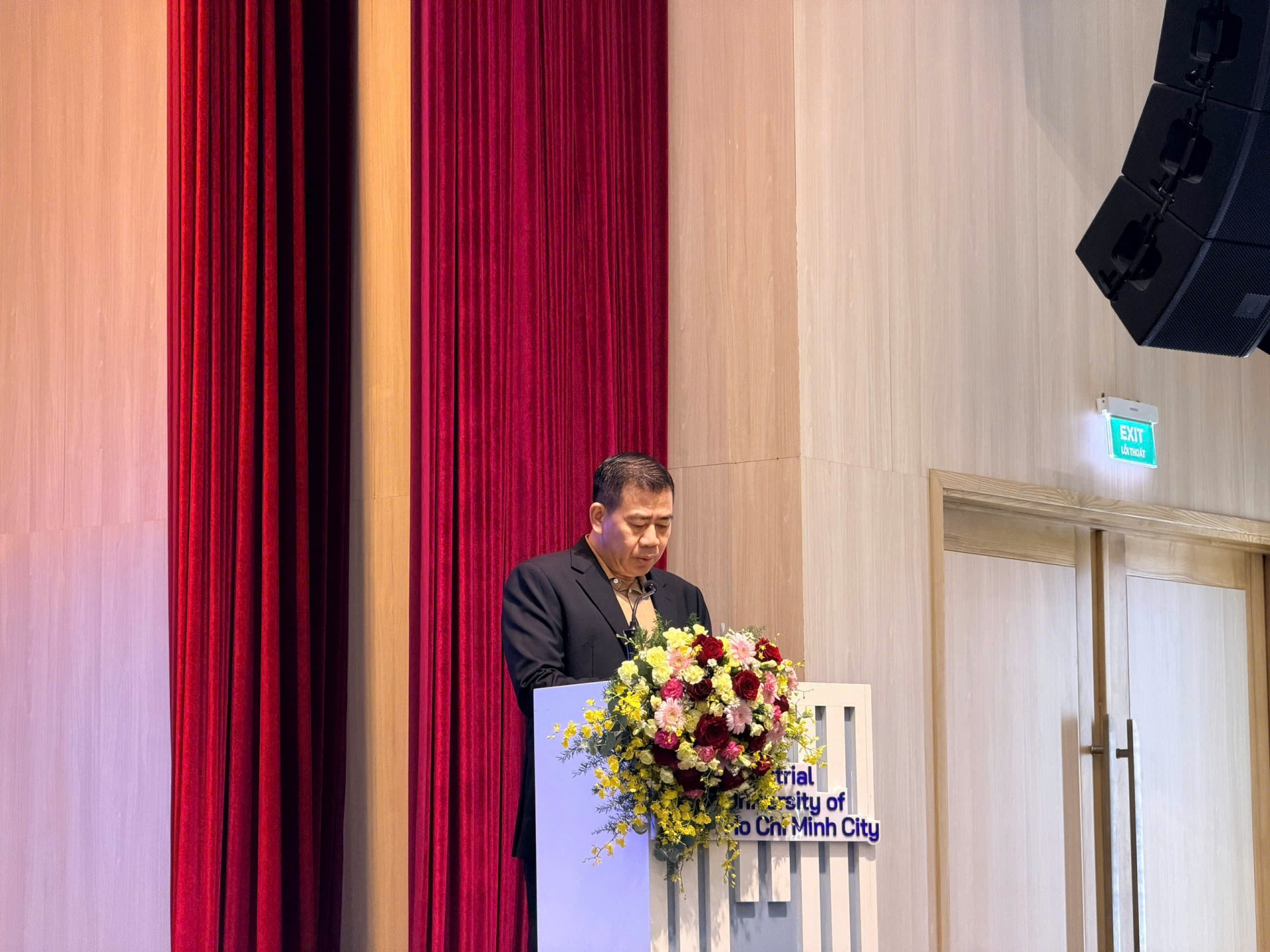 Assoc. Prof. Phan Hong Hai, rector of Ho Chi Minh City University of Industry, delivers the opening remarks at the event