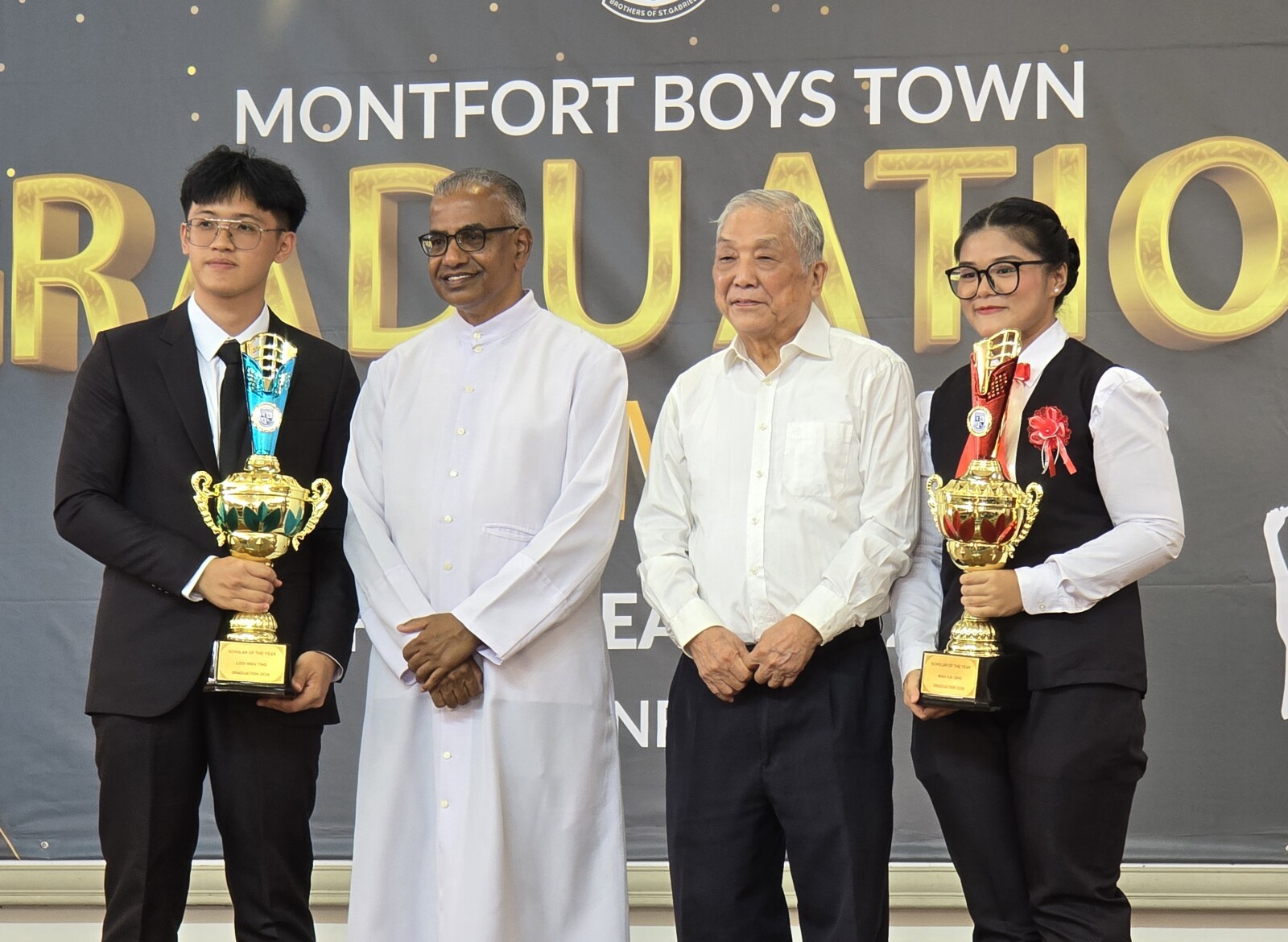 Scholars of the year proving that MBT continues to contribute to the development of Malaysia's skilled talent pipeline through practical, industry-focused vocational training. (From left): Looi Wen Ting, Brother Director Robin Devasagayam, Chairman of the Board of Governors Ir. Dr. Philip Tan Chee Lin, and Wan Kai Qing