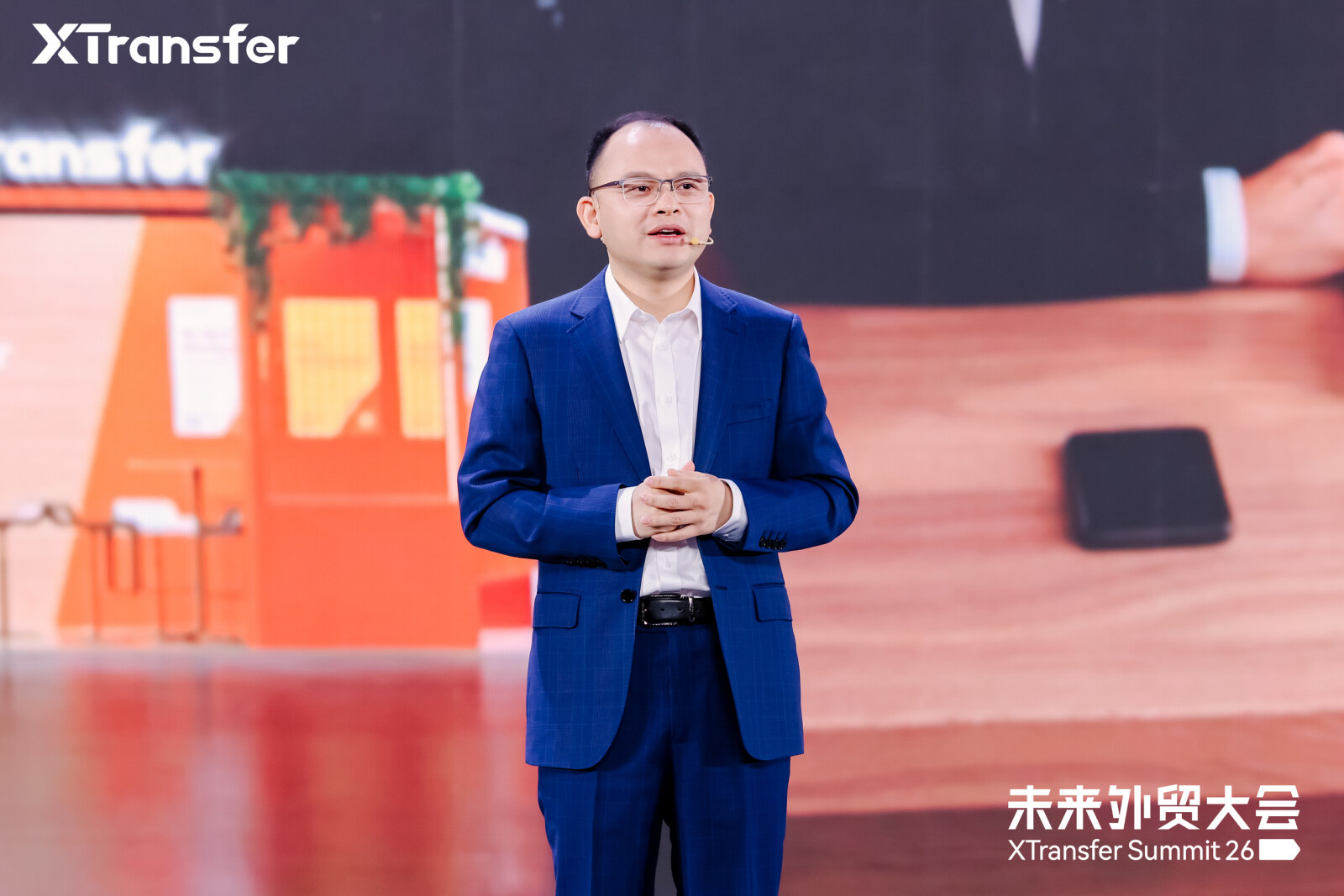 Bill Deng, Founder and CEO of XTransfer, speaks at the summit.