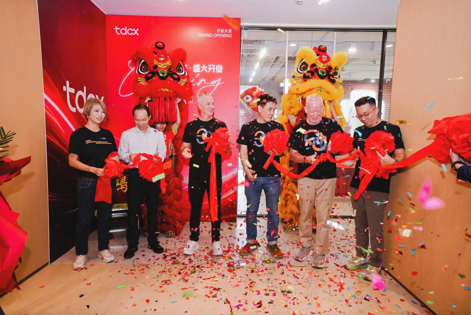 TDCX celebrates the grand opening of its Foshan campus, its sixth center in China. From left to right: Angie Tay (EVP and Group COO), guest of honour Mr. Guo Yaoyu (Deputy Director, Management Office, Nanhai District, Foshan ), Laurent Junique (Founder and CEO), Chin Tze Neng (CFO), Michael Cowell (Managing Director, Hong Kong) and Tony Chen (Country Director, China).