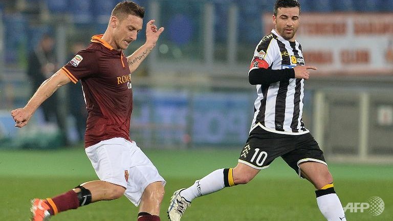 totti strikes as roma scrape udinese win