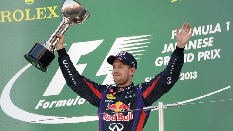 vettel wins japan thriller world title on hold