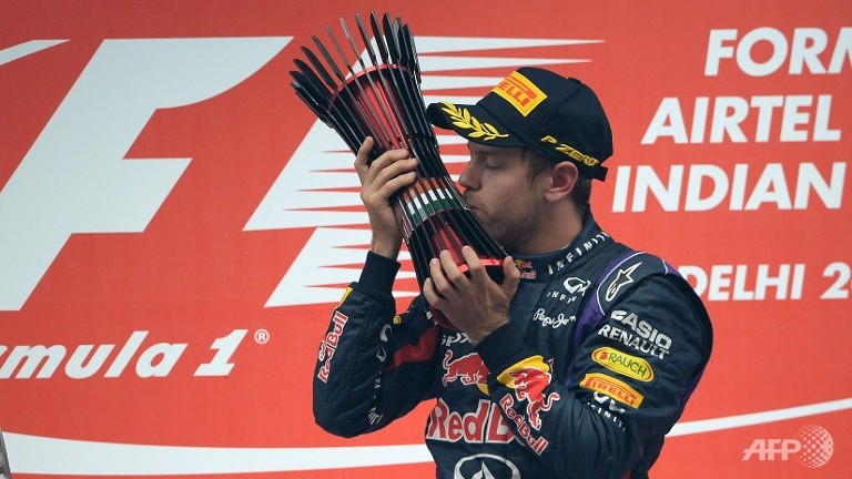 dominant vettel seizes historic world title