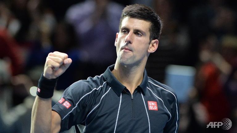 djokovic subdues federer to start title defence