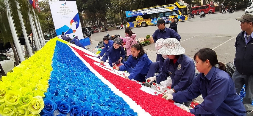 hanoi to celebrate the us north korea summit with flags and flowers