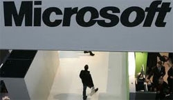 microsoft net profit slips despite record 2q revenue