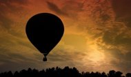 File illustration photo shows a hot air balloon. A hot air balloon burst into flames and crashed to the ground in New Zealand on Saturday, killing all 11 people on board, after apparently hitting a power line