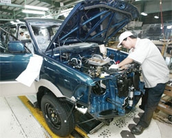Carmakers fume over fees