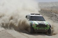 French driver Stephane Peterhansel steers his Mini during the stage 11. Peterhansel consolidated his overall lead in the car section of the Dakar Rally with victory in the 11th stage of the gruelling race, between Arica, Chile, and the Peruvian town of Arequipa.