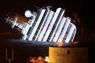 Night view of the cruise liner Costa Concordia. Italian rescuers on Monday searched the wreck of a stricken luxury liner three days after it crashed on the shores of Tuscany as the number missing was revised upward to 29.