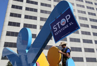 A demonstrator protests the Keystone XL oil pipeline outside a fundraiser for Barack Obama in San Francisco, California, in October 2011. Obama rejected the proposed Keystone XL pipeline from Canada, saying he could not vouch for its safety by a deadline despite intense election-year pressure.