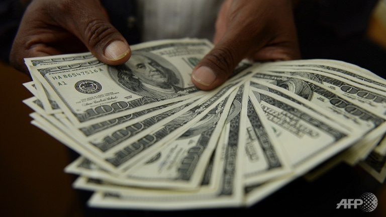 us dollar slips after poor december pmi numbers