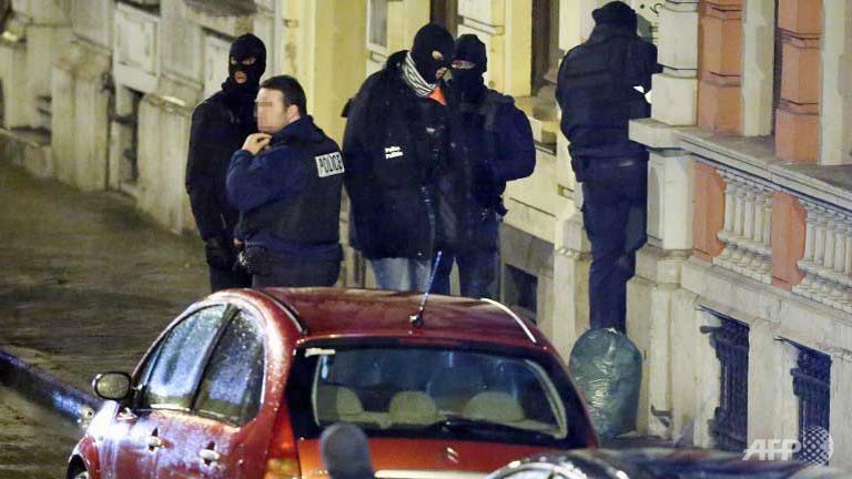 two dead in police anti terror raid in belgium