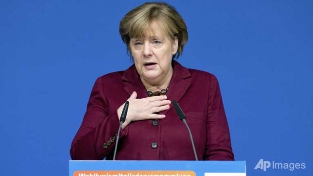 merkel slams trump travel ban cites geneva convention