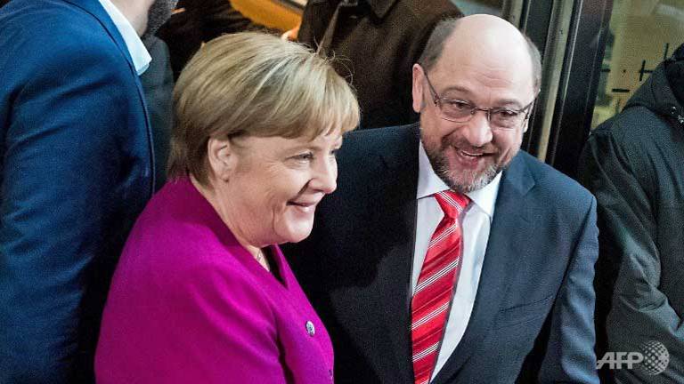 merkel schulz vow new politics for germany in bid to form government